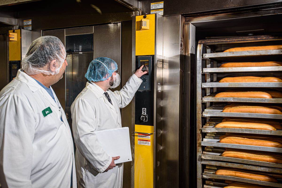 COR auditor inspecting products at a food plant